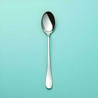 metallico cucchiaio su blu sfondo minimalismo. alta risoluzione. ai generativo foto