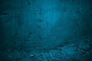 blu parete pauroso struttura per sfondo. buio blu Cracked cemento foto