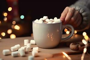 ai generato un' persona Tenere un' tazza di caldo cioccolato con marshmallows foto