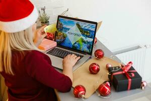 prenotazione Natale vacanza su il computer portatile foto