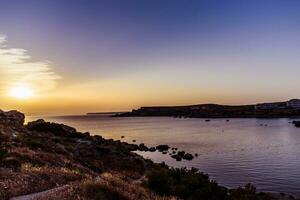 spettacolare tramonto nel il baia la zona foto