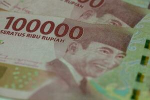 indonesiano moneta uno centinaio mille rupia foto
