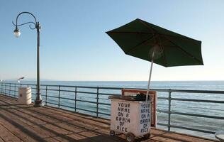 il tuo nome su un' grano di riso venditore Santa monica foto