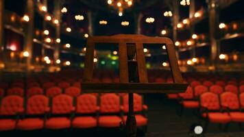 un vuoto auditorium con rosso posti a sedere e luci foto