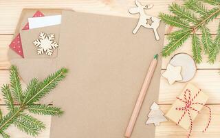Natale sfondo con foglio di carta e matita foto