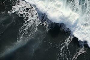 ai generato aereo Visualizza di tempestoso oceano onde rottura su nero sabbia spiaggia, aereo Visualizza di onde su il nero sabbia spiaggia, ai generato foto