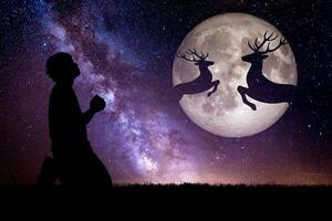 notte cervo silhouette contro il fondale di un' grande Luna. sfondo per Natale foto