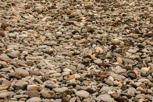 un' grande mucchio di rocce e ghiaia foto