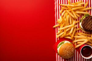 ai generato fatti in casa Hamburger con fresco verdure e francese patatine fritte su buio sfondo foto