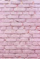 sfondo di un muro da un mattone rosa foto