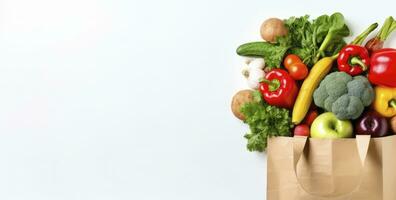 ai generato salutare cibo nel carta Borsa verdure e frutta su bianca sfondo. ai generato foto