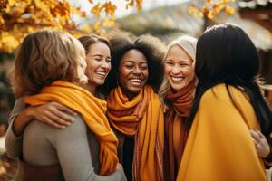 ai generato contento sorridente ragazze di diverso nazionalità abbracciare tra gli amici, radiante calore e supporto durante un' consapevolezza ritiro foto