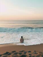 ai generato un' persona è seduta vicino il acqua a il spiaggia, foto