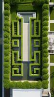 ai generato un' sbalorditivo aereo tiro di un' moderno giardino design con un' geometrico modello di siepi. foto