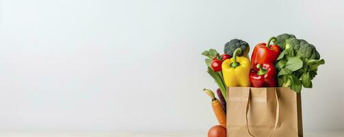 ai generato salutare vegetariano cibo confezionato nel un' carta Borsa con verdure foto