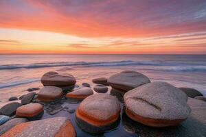 ai generato bellissimo rocce su il spiaggia a tramonto. professionista foto