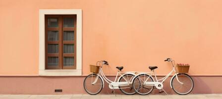 ai generato Due biciclette pendente su contro un arancia Casa foto