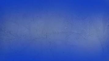 struttura del cemento e sfondo sfumato orizzontale blu. foto