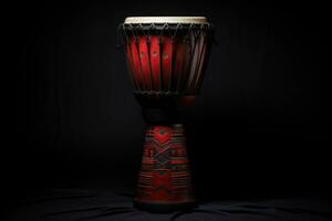 ai generato djembe tamburo su un' nero sfondo. tradizionale percussione musicale strumento di africano cultura. adatto per musicale disegno, articolo, blog, sociale media inviare, album coperchio, manifesto. foto