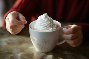 ai generato bianca bellissimo tazza con un' caldo bevanda e frustato crema nel figli di mani foto