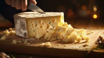 ai generato un' piatto di formaggio è tagliare nel un' coltello foto