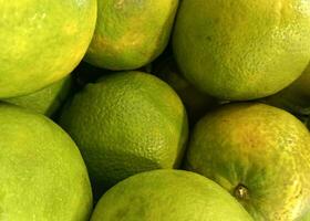 esotico arancia frutta, Limone, o lime. fresco e salutare frutta foto