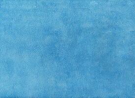 blu stoffa struttura di microfibra tessuto sfondo. foto
