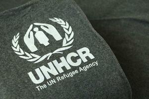 kiev, Ucraina - Maggio 4, 2022 L'UNHCR il un profugo agenzia logo su umanitario grigio coperte foto