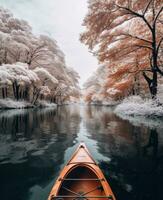 ai generato un attraente decorato kayak è galleggiante passato neve coperto alberi nel un' lago foto