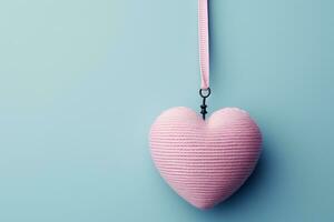 ai generato a maglia rosa cuore sospeso di nastro, San Valentino giorno concetto. foto
