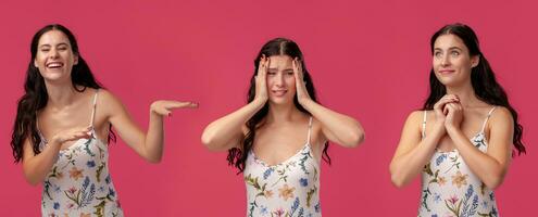 bellissimo donna nel un' bianca vestito con floreale Stampa in posa contro un' rosa studio sfondo. foto