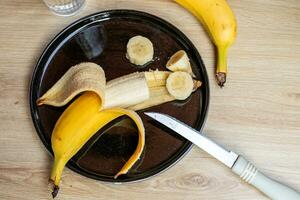 ai generato affettato Banana sano merenda preparazione foto