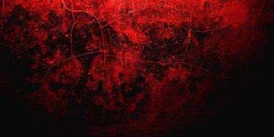 sfondo rosso spaventoso. cemento rosso scuro grunge texture foto