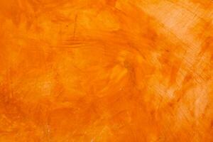 strutturato parete spazzolato dipinto sfondo, astratto arancia olio colore. foto