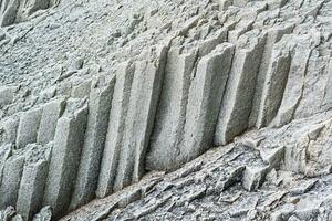 naturale roccia sfondo, vulcanico colonnare articolato basalto foto