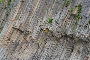 naturale sfondo, roccia frammento a partire dal vulcanico lava colonne foto