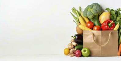 ai generato salutare cibo nel carta Borsa verdure e frutta su bianca sfondo. ai generato foto