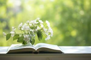 ai generato gelsomino fiori nel un' vaso e Aperto libro su il tavolo, verde naturale sfondo. ai generato foto