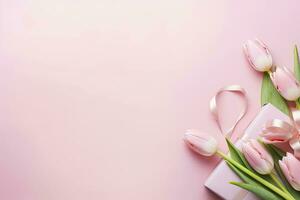 ai generato rosa regalo scatola con nastro arco e mazzo di tulipani su isolato pastello rosa sfondo. ai generato foto