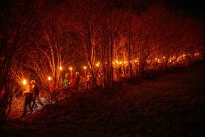 torcia processione in attesa Natale foto