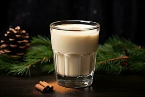 ai generato Natale caldo bere. zabaione con cannella nel bicchiere foto