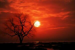 ai generato nature Dramma il giro sole su rosso tramonto cielo con albero foto