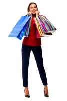 bella donna con shopping borse. isolato su bianca sfondo. foto