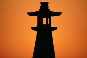 tradizionale giapponese faro a tramonto foto