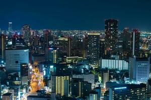 un' notte panoramico paesaggio urbano nel osaka alto angolo foto