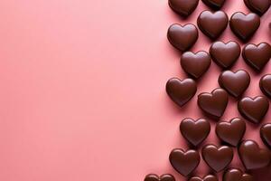 ai generato cioccolato cuore sagomato caramelle su rosa sfondo con copia spazio. San Valentino giorno celebrazione. ai generato. foto