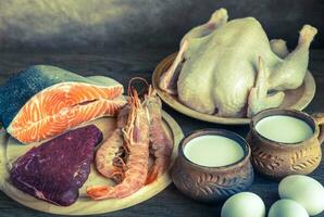 proteina dieta crudo prodotti su il di legno sfondo foto