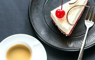 torta di formaggio con tazza di caffè foto