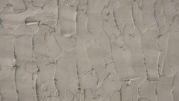 calcestruzzo parete sfondo e dettaglio rugosità grano struttura di cazzuola intonacatura su superficie foto