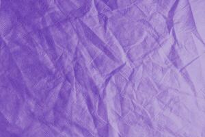 rugoso, spiegazzato viola spunbond tessuto struttura sfondo foto